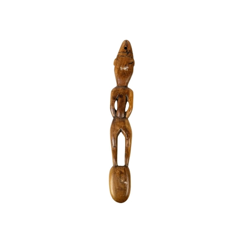 225 - A possible Polynesian wood carved male figural ladle, Length 49cm. Maurice Jenkins (1933-2022). Nort... 