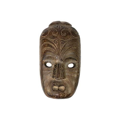 232 - A wood carved Maori mask. Length 40cm. Maurice Jenkins (1933-2022). North Cornwall collector. Mauric... 