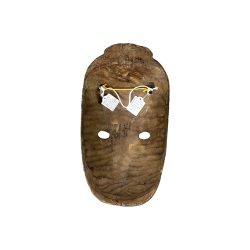 232 - A wood carved Maori mask. Length 40cm. Maurice Jenkins (1933-2022). North Cornwall collector. Mauric... 