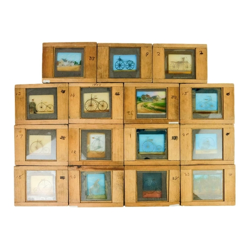 24 - A collection of 33 magic lantern slides. Depicting the History of the bicycle with a laminated list ... 