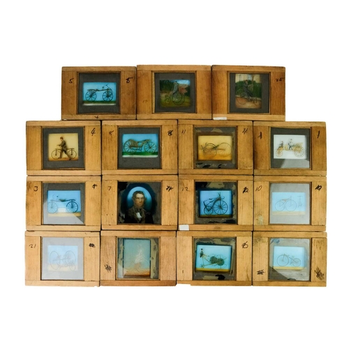 24 - A collection of 33 magic lantern slides. Depicting the History of the bicycle with a laminated list ... 