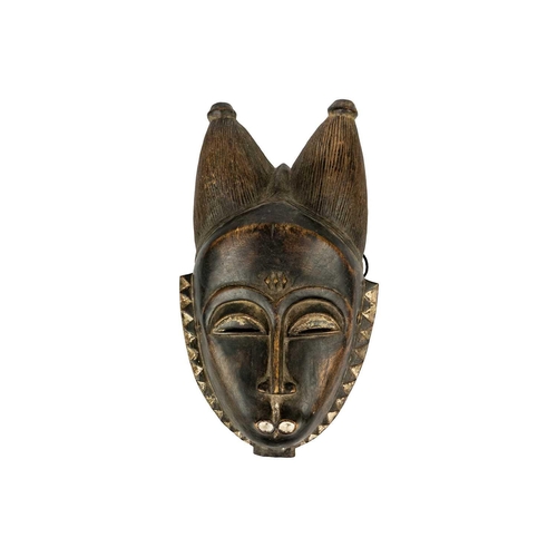 240 - A Baule mask. Ivory Coast, with white pigment, height 35cm. Maurice Jenkins (1933-2022). North Cornw... 