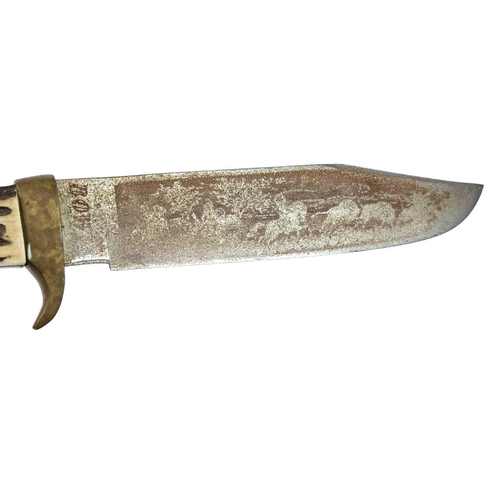 243 - A large original Bowie knife, by Whitby, Solingen. With antler grip, the 25cm blade engraved with a ... 