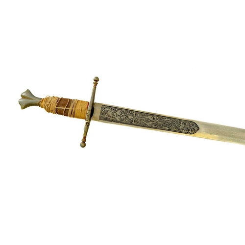 246 - A reproduction sword, with a wavy blade. Length 120cm, and another similar sword (2).