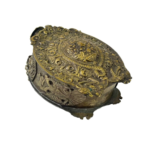 256 - A cast brass Russian powder flask and cover. 19th century, each face decorated with entwined dragons... 