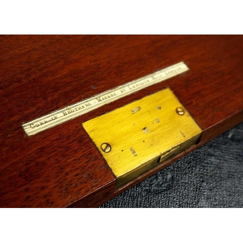 257 - A Victorian burr walnut and brass bound writing slope. The fitted interior with leather skiver and t... 