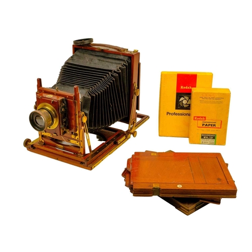 259 - A Thornton Pickard Triple Victo mahogany folding plate camera. With a Busch's rapid symmetrical F:8 ... 