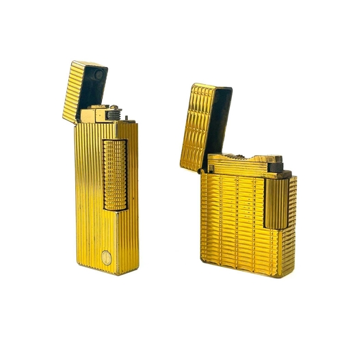 262 - A Dunhill gold plated pocket lighter. Height 6.4cm, together with a DuPont lighter, serial number EK... 