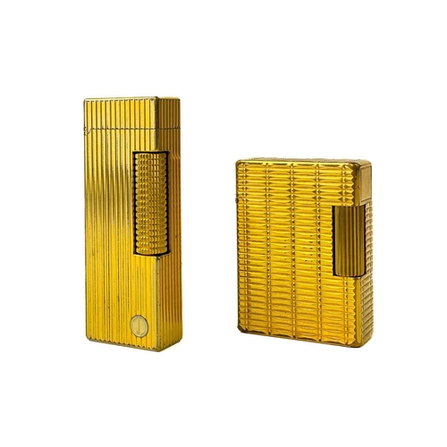 262 - A Dunhill gold plated pocket lighter. Height 6.4cm, together with a DuPont lighter, serial number EK... 