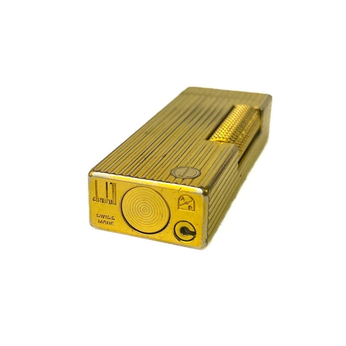 262 - A Dunhill gold plated pocket lighter. Height 6.4cm, together with a DuPont lighter, serial number EK... 