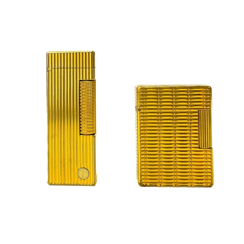 262 - A Dunhill gold plated pocket lighter. Height 6.4cm, together with a DuPont lighter, serial number EK... 