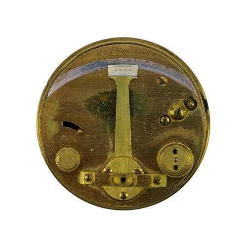 295 - A brass pocket sextant by W & S Jones London. Diameter 7cm together with a brass compass with a floa... 