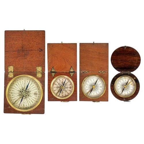 311 - A 19th century travel compass with printed card dial in a square oak case. 5.5cm, Together with thre... 