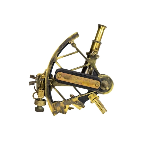 316 - A lacquered brass sextant. Stamped Henry Hughes Son, London, width 23cm.