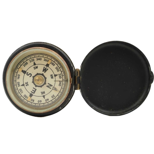 319 - An early 20th century brass compass with mother of pearl dial. Inscribed J.S Bousfield 8th East Lanc... 