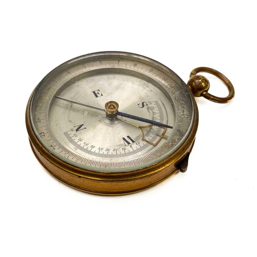 320 - A brass dip needle compass. Diameter 9.5cm together with five various compasses. (6)