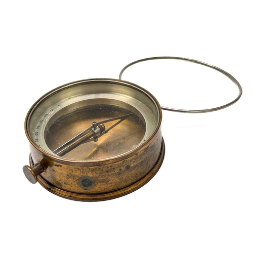 320 - A brass dip needle compass. Diameter 9.5cm together with five various compasses. (6)