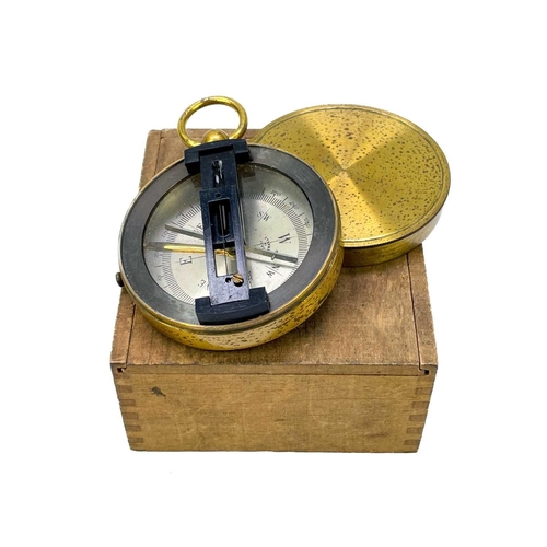 320 - A brass dip needle compass. Diameter 9.5cm together with five various compasses. (6)