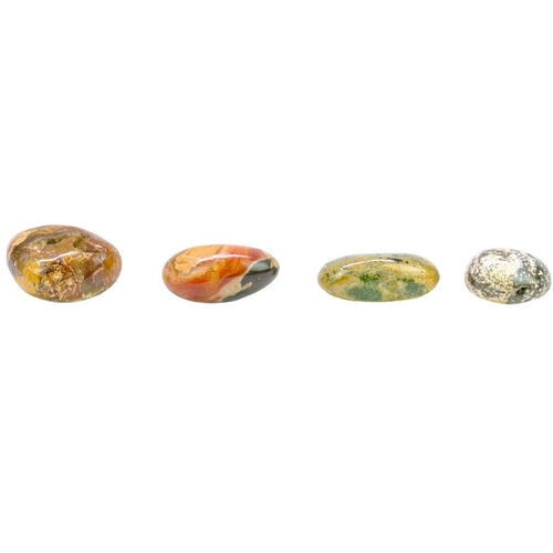 34 - A collection of polished minerals. To include; Petrified wood, blue calcite, polychrome jasper, ocea... 