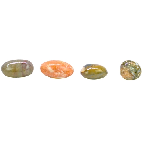 34 - A collection of polished minerals. To include; Petrified wood, blue calcite, polychrome jasper, ocea... 