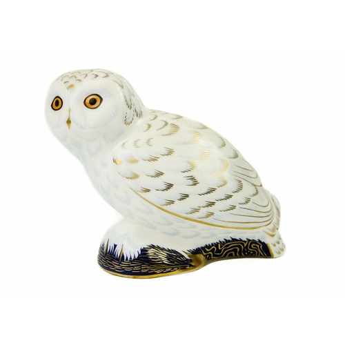 358 - Two Royal Crown Derby paperweights. Comprising 'Barn Owl' and 'Snowy Owl'.