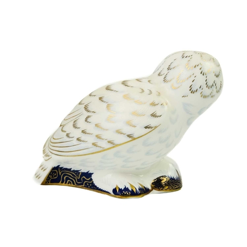 358 - Two Royal Crown Derby paperweights. Comprising 'Barn Owl' and 'Snowy Owl'.