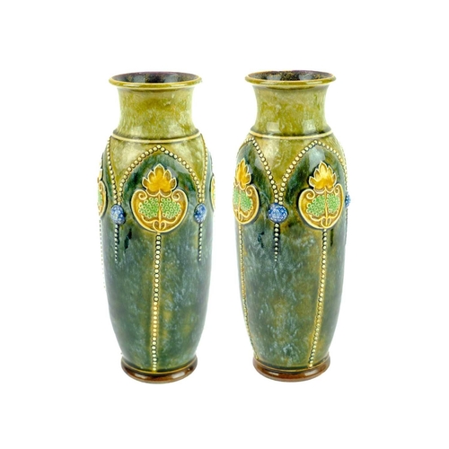 364 - A pair of Royal Doulton stoneware vases. Height 25cm. (2) No condition issues.