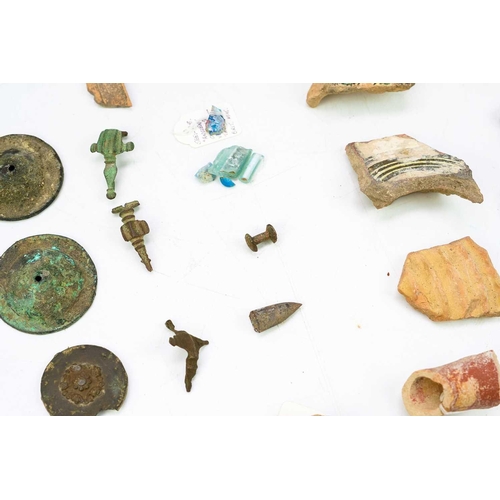 38 - A group of Cypriot pottery shards and glass fragments. Together with various bronze items including ... 