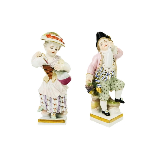 381 - A pair of Meissen porcelain figures of child vintners. Height 10cm. (2) The girl has glued repairs o... 