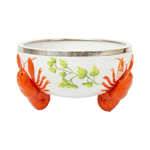 383 - A porcelain salad bowl. Moulded with three lobster supports, with a WMF plated mount, and a serving ... 