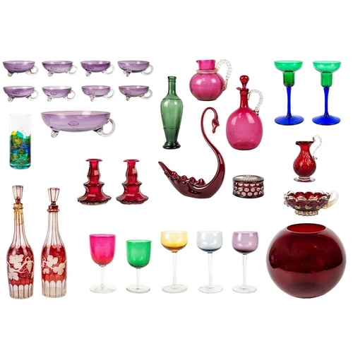 385 - A collection of coloured glass. To include an amethyst punch/dessert set comprising a handled bowl, ... 