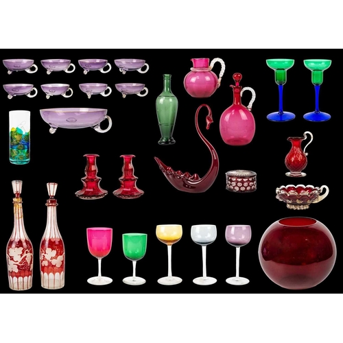 385 - A collection of coloured glass. To include an amethyst punch/dessert set comprising a handled bowl, ... 