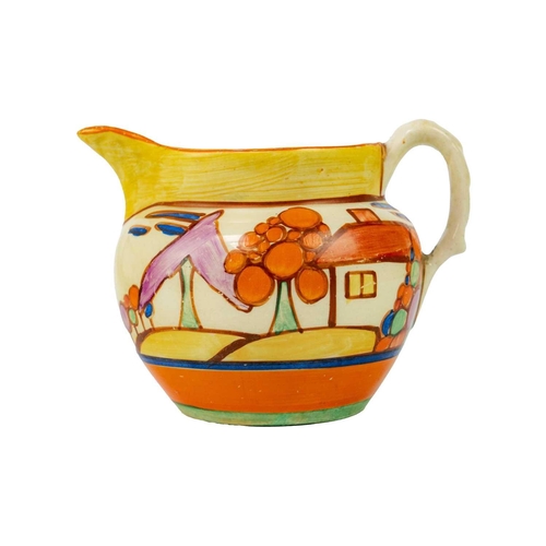 386 - A Clarice Cliff Seven Colour Trees & House pattern Perth jug. Fantasque Wilkinson Ltd mark, height 8... 