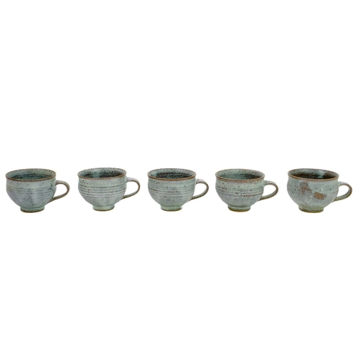 390 - Louis Hanssen (1934-1968) A studio pottery punch bowl, with ladle, and thirteen cups. Impressed mark... 