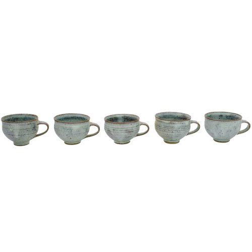 390 - Louis Hanssen (1934-1968) A studio pottery punch bowl, with ladle, and thirteen cups. Impressed mark... 