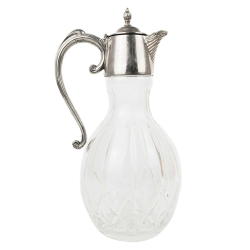 394 - A cut glass claret jug. Height 32cm.