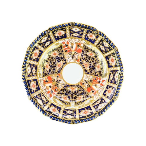 396 - A pair of Royal Crown Derby Imari pattern porcelain plates. Diameter 22.5cm, together with a cup and... 