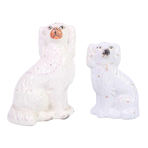 402 - A pair of Staffordshire liver and white spaniels. Height 31cm, together with three other pairs and s... 