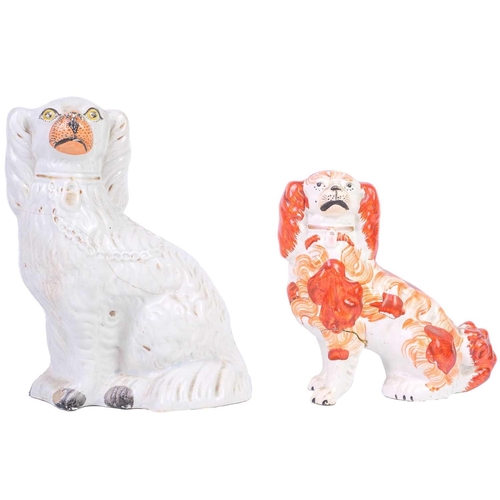 402 - A pair of Staffordshire liver and white spaniels. Height 31cm, together with three other pairs and s... 