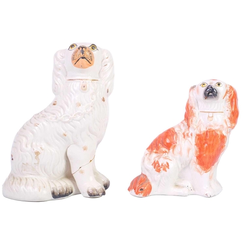 402 - A pair of Staffordshire liver and white spaniels. Height 31cm, together with three other pairs and s... 