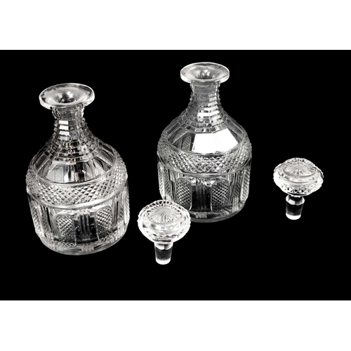 413 - A pair of Georgian design cut glass decanters and stoppers. Circa 1900, with hobnail cut panels, hei... 