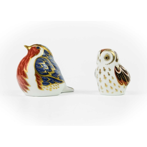 423 - Four Royal Crown Derby paperweights. Comprising 'Robin', 'Owlet', 'Bluebird' and 'Ladybird'.