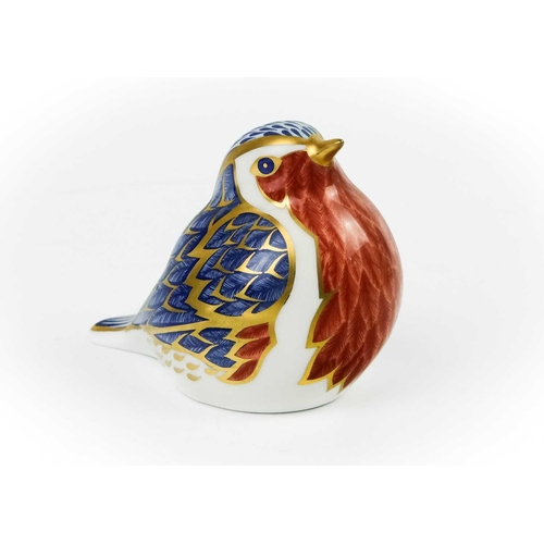 423 - Four Royal Crown Derby paperweights. Comprising 'Robin', 'Owlet', 'Bluebird' and 'Ladybird'.