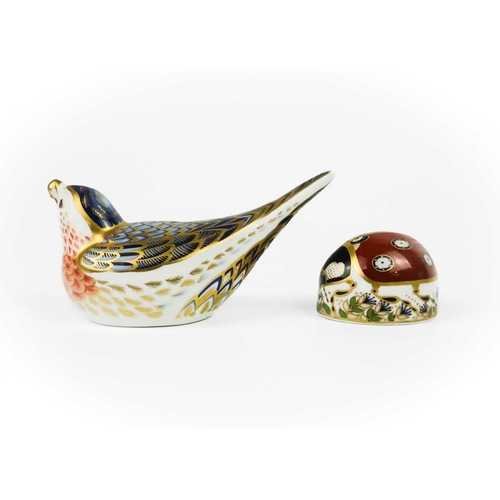 423 - Four Royal Crown Derby paperweights. Comprising 'Robin', 'Owlet', 'Bluebird' and 'Ladybird'.