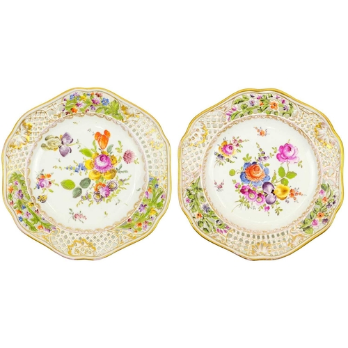 427 - A pair of Carl Thieme Potschappel ribbon plates. Late 19th century, with floral painted bouquets and... 