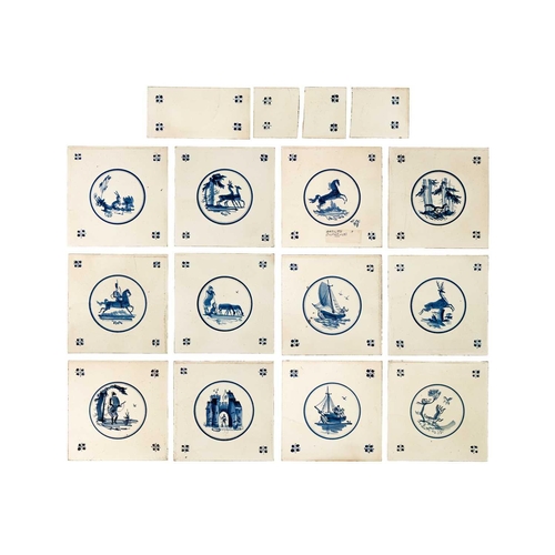 428 - A group of 12 German Malacca tiles. Hand painted in blue and white, with Delft style scenes of figur... 