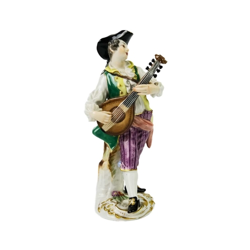 429 - A Meissen porcelain figure of a lute player. On rococo scroll base, height 14cm together with a Meis... 