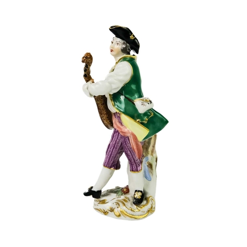 429 - A Meissen porcelain figure of a lute player. On rococo scroll base, height 14cm together with a Meis... 