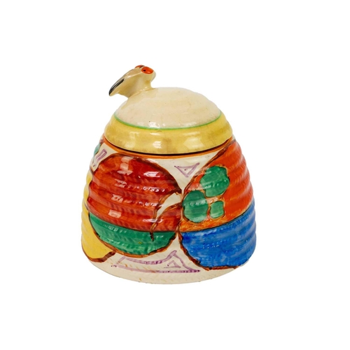 430 - A Clarice Cliff Melon pattern beehive honey pot and matched cover. Fantasque Bizarre Newport Pottery... 