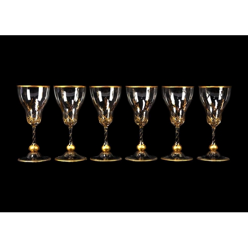 435 - A set of six gilt decorated sherry glasses. Circa 1930, the bowls decorated in gilt with grasses, th... 